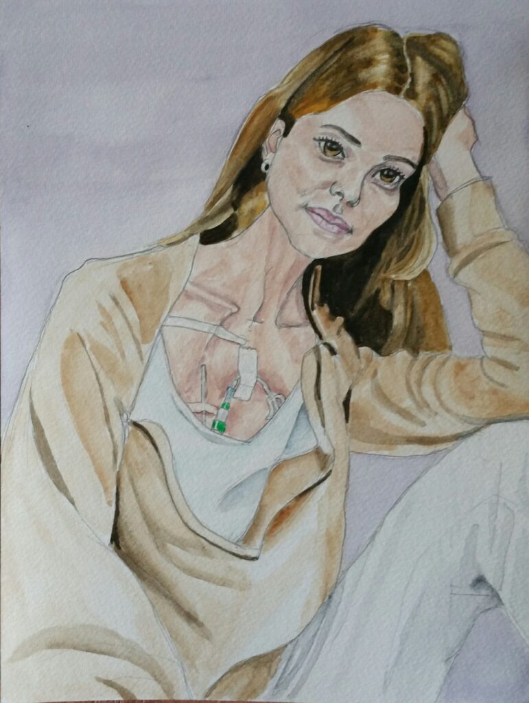 ID partially painted portrait of beautiful woman - she has her head tilted to one side resting on her hand, and that arms is resting on her raised knee, at the elbow. Her other arm is dangling. She has dark blonde long hair and hazel eyes, She is wearing a voluminous baggy top which is brown with pale blue lining, her trousers are white . On her chest is an array of tapes and tubes.