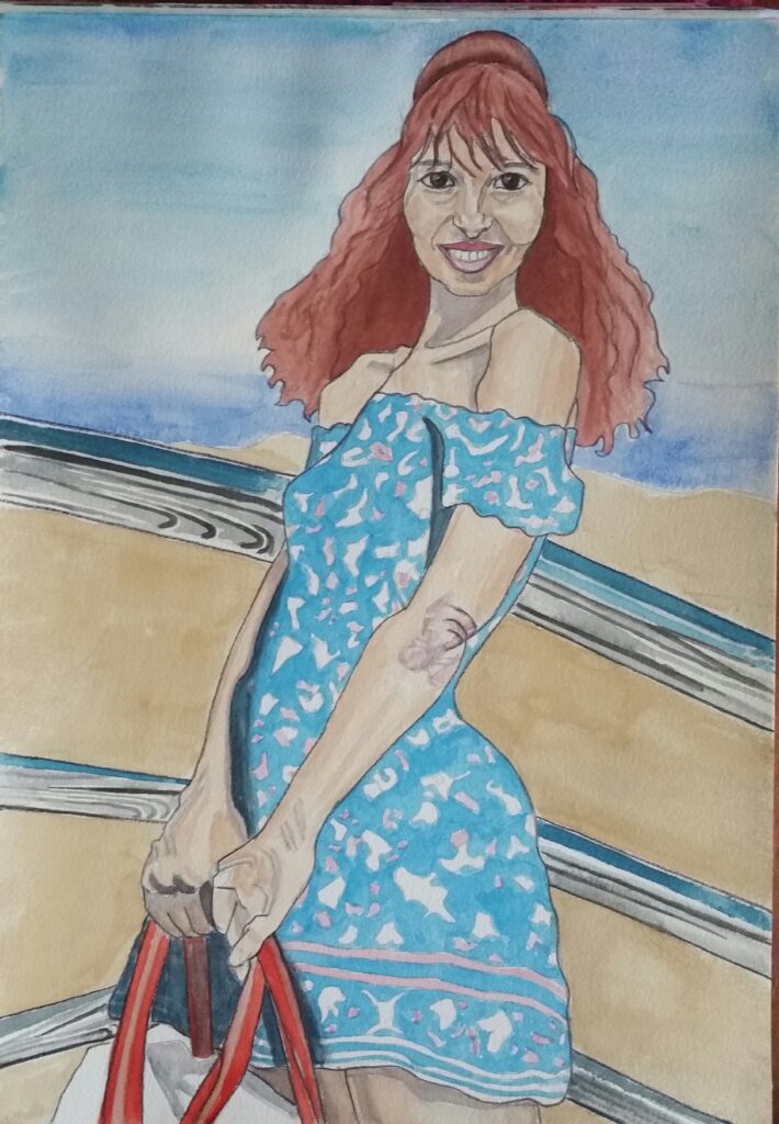 ID watercolour painting of very pretty woman - she has long dark red wavy hair and big brown eyes, she is smiling. She is wearing a blue patterned dress and the pattern is pink and white. Her head is viewed from straight on and her body is turned to one side. she is leaning backwards slightly to counteract the weight of the bad she is holding with both hands, arms stretched holding it. The straps of the bag are shades of red and the bag is white. Behind her can be seen some thick metal railings and a beach view.