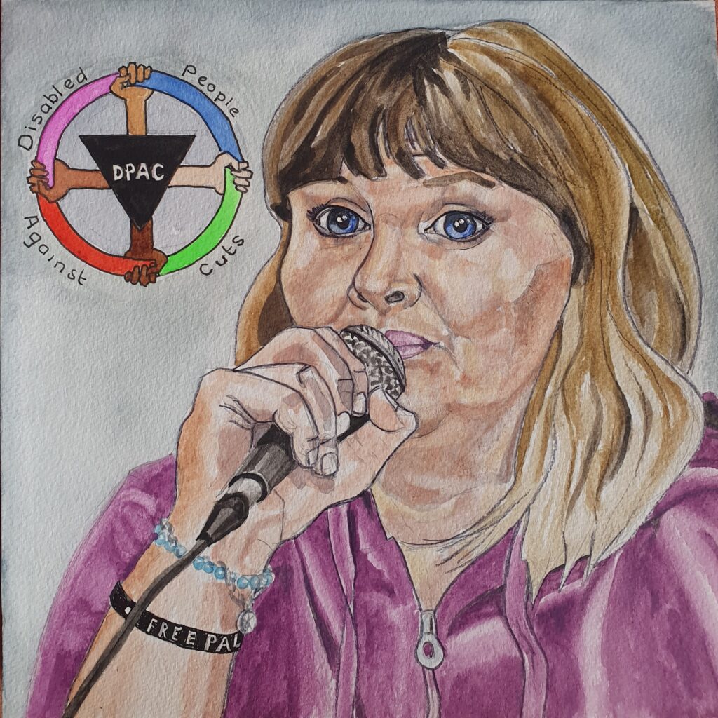 ID Woman holding mircrophone to mouth, she has shoulder length hair and a fringe her hair is a mixture between blonde and dark, going paler at the ends. She has large blue eyes. She is wearing a purple hoody and a couple of bracelets and her head is 3/4 angle. on the left hand side of the painting is the DPAC logo which is a circle with 4 arms and hands of different skin tones holding the edge of the circle at its 4 quarters. The rim of the circle is lilac, blue, red and green in each quarter. In the centre of the circle is an upside down black triangle in black with DPAC in white lettering in the middle of it. Round the outside of the circle in plain black lettering is written "Disabled People Against Cuts" with one word being written in each quarter" The background of the painting is grey.