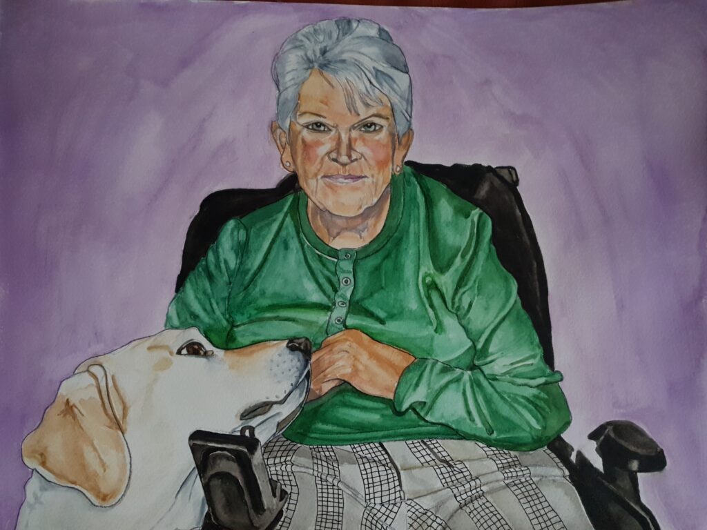 ID Watercolour painting of Mature, attractive women, with short grey hair which is bouffant on top. She is wearing a green cardigan and checked trousers. A gorgeous golden labrador is resting their head on the arm of her wheelchair and looking up at her adoringly. The background is lavender