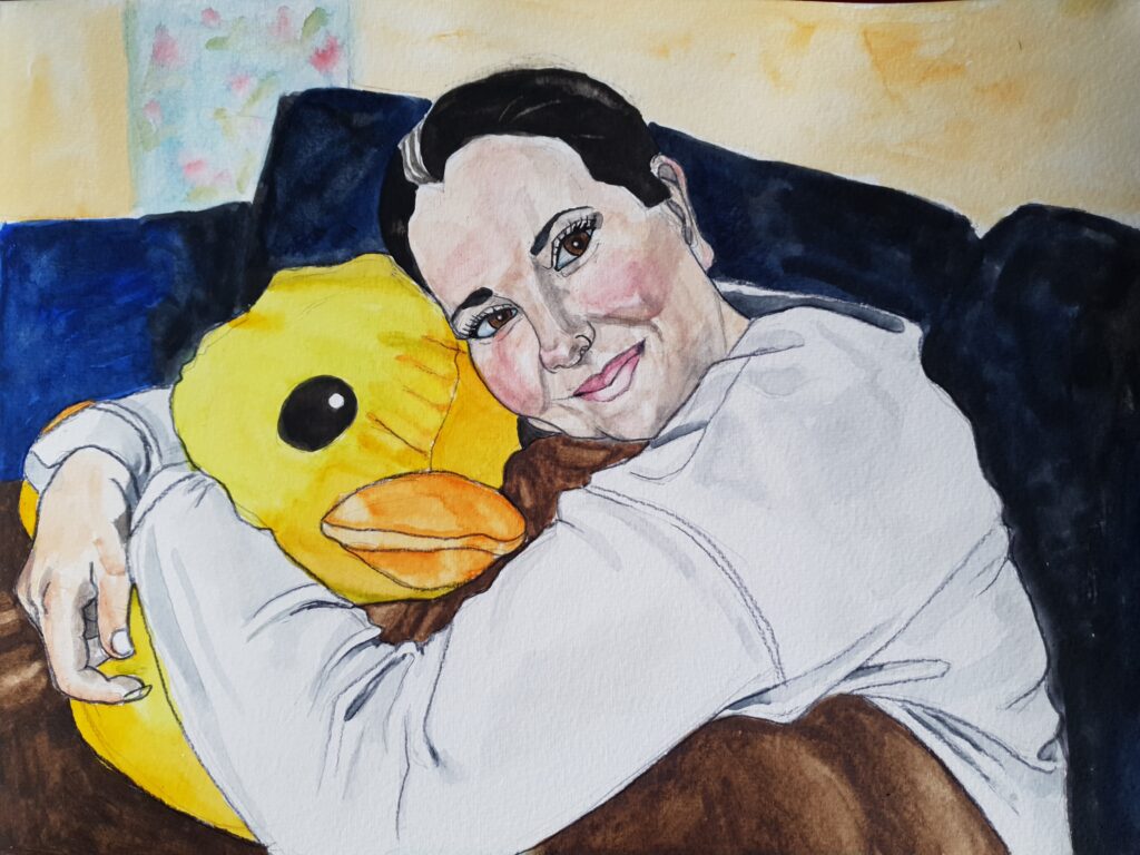 Watercolour painting of dark haired woman cuddling large yellow duck, she has a white streak in the middle of her hair, and is wearing a whilte top and covered, from teh waist down, with a brown blanket, on which is sat the duck, she is on a dark blue sofa