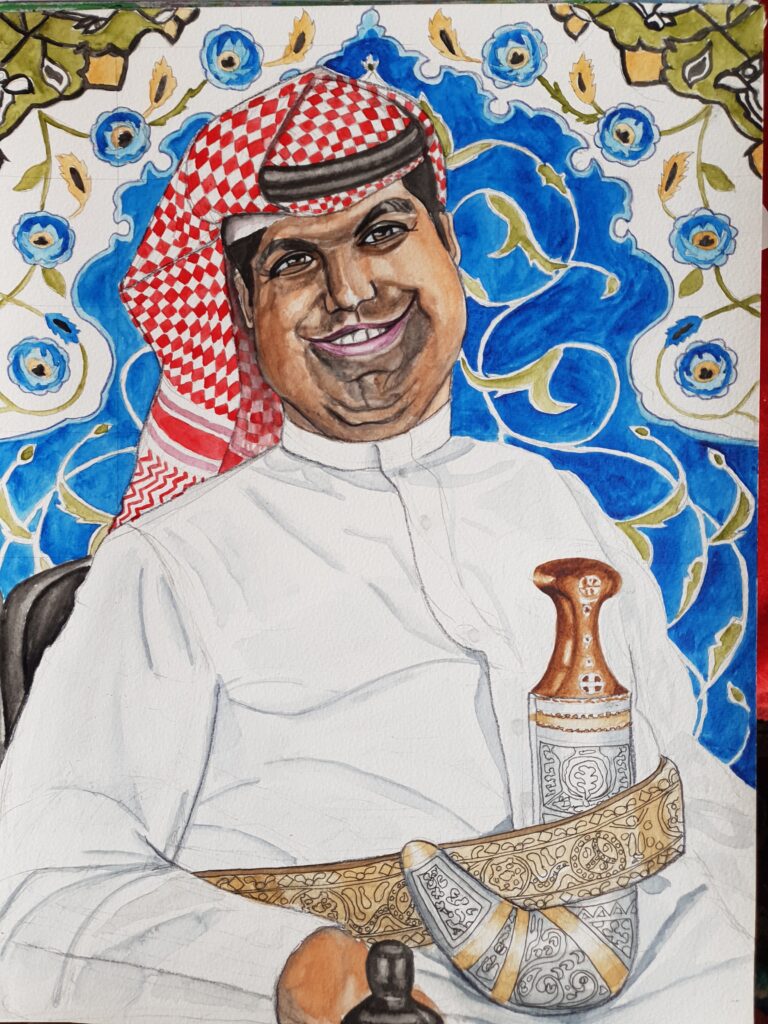 ID Smiling man with humerous kind eyes dressed in traditional best mans dress for an Iraqi wedding. He is wearing a shemagh - a red and white checkered head dress and a white tunic around which is an ornate belt of gold and curved dagger in an ornate sheath. of gold and silver. In the background is a traditional pattern made up of tiles, the patterns are predominantly blue with white then green border, with patterns based loosely on florals.