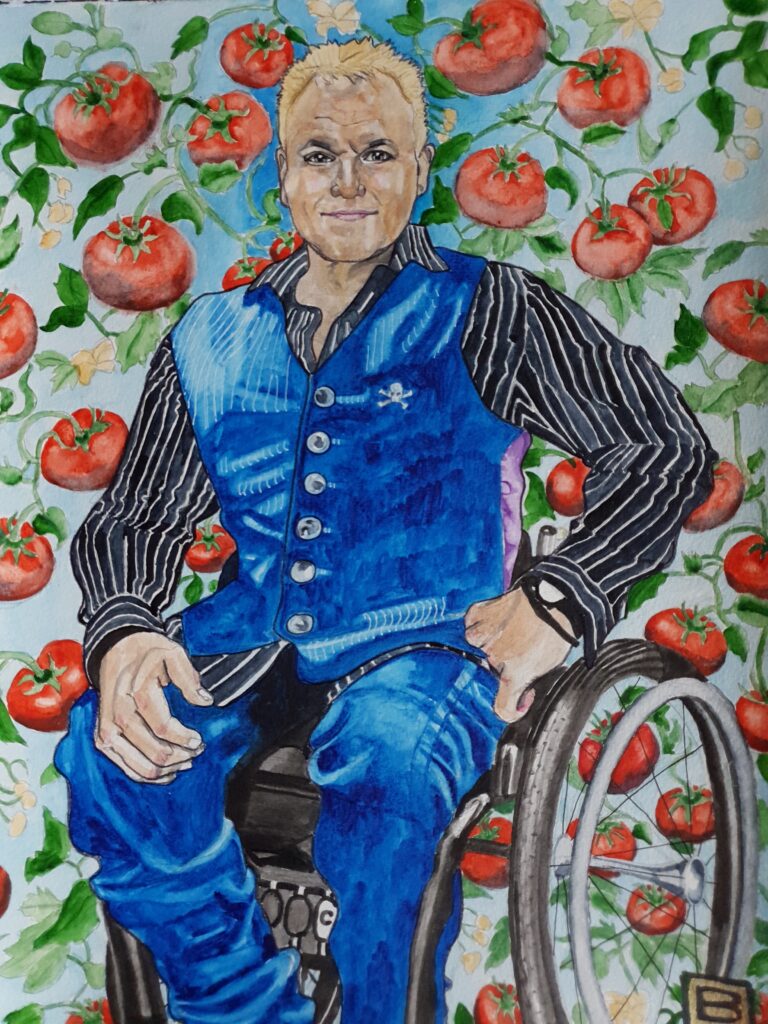 ID Portrait of Mik Scarlet, he has blonde spikey hair and is wearing a black striped shirt and blue waistcoat and trousers. He is sat in his wheelchair with one hand on hip and one resting on his knee. Behind him can be seen Tomatoes with their foliage on a pale blue background showing Mik's love of gardening and symbolising life blood, vitality and abundance.